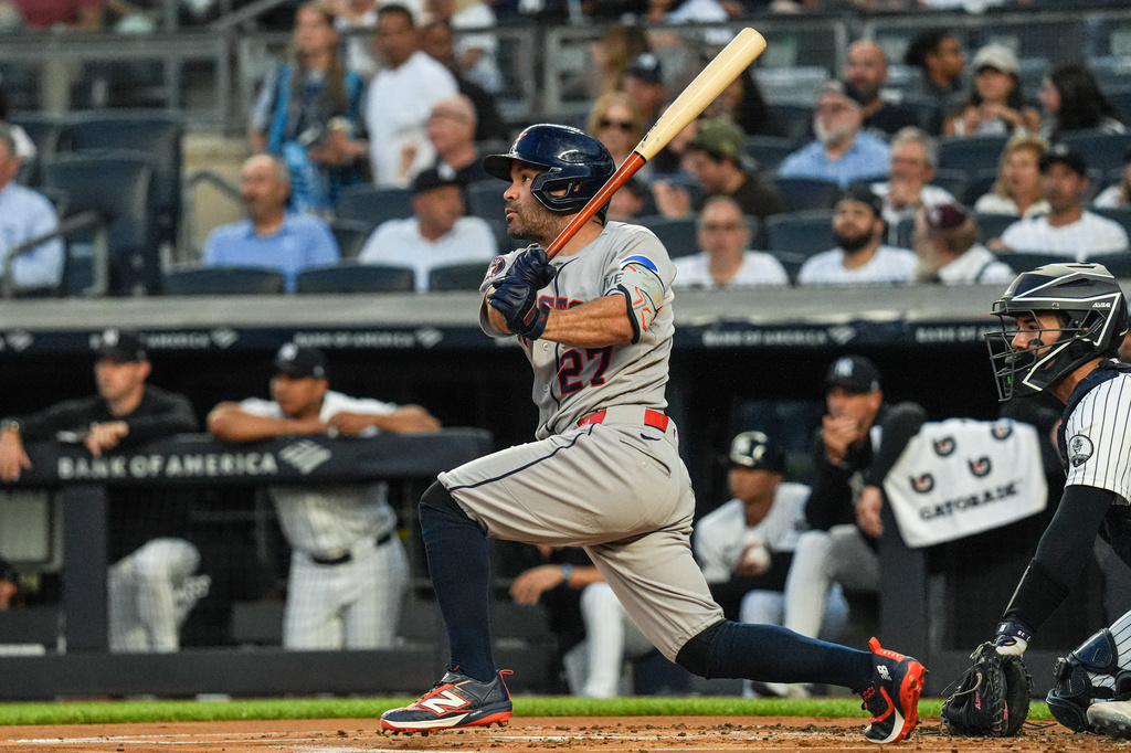 Houston Astros second baseman Jose Altuve (27) hits a RBI double during the first inning of a baseball game against the New York Yankees Wednesday, Aug. 26, 2026, in New York. (AP Photo/Ryan Murphy)