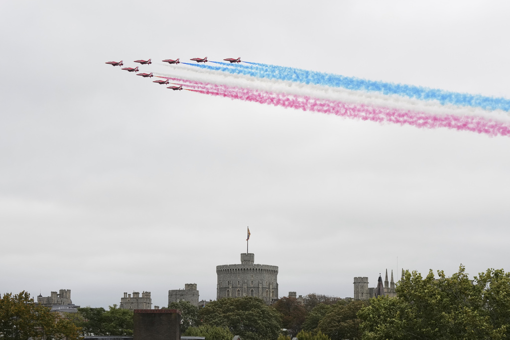 The Red Arrows fly in formation over Windsor Castle during the State visit of President Donald Trump in Windsor, England, Wednesday, Sept. 17, 2025.(AP Photo/Alastair Grant)