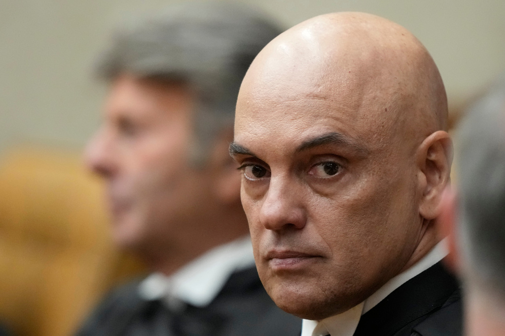 FILE - New Vice President of the Supreme Court, Judge Alexandre de Moraes, attends his swearing-in ceremony in Brasilia, Brazil, Sept. 29, 2025. (AP Photo/Eraldo Peres, File)