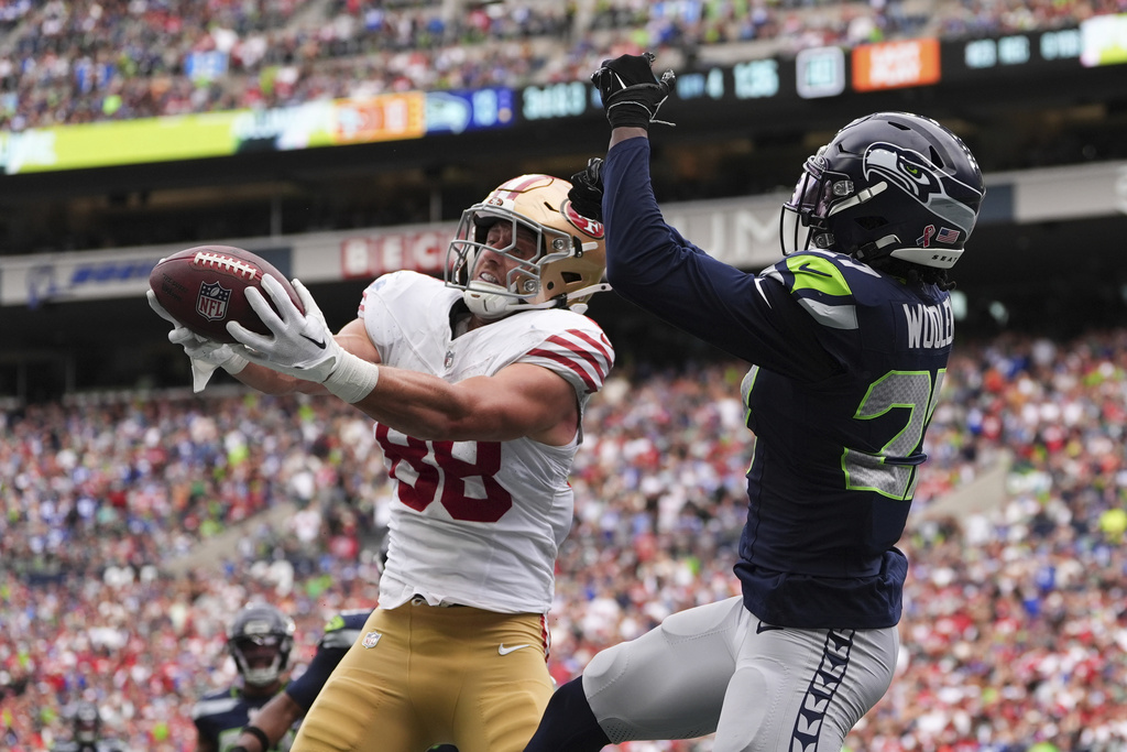San Francisco 49ers tight end Jake Tonges (88) makes a touchdown catch during the second half of an NFL football game against the Seattle Seahawks, Sunday, Sept. 7, 2025, in Seattle. (AP Photo/Lindsey Wasson)