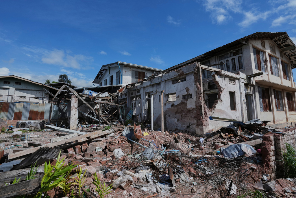 In this photo taken during a trip supervised by pro-military Myanmar media, a damaged residence is seen in Kyaukme, northern Shan State, Myanmar, Friday, Oct. 10, 2025. (AP Photo/Aung Shine Oo)