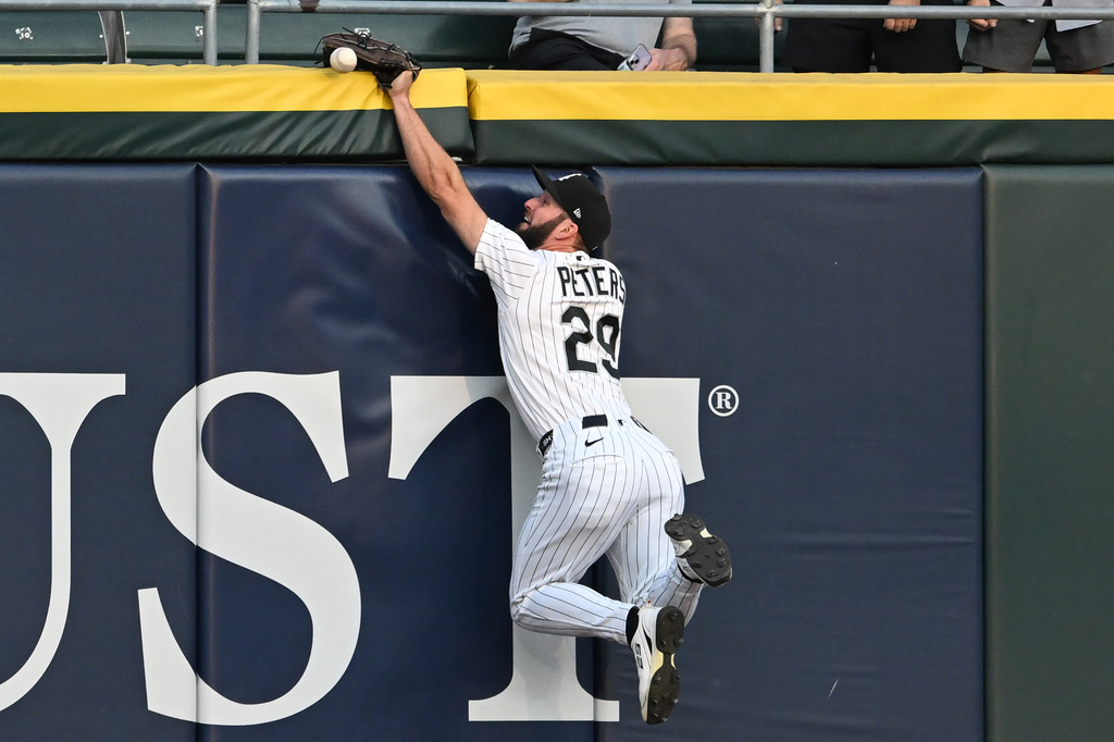 Chicago White Sox center fielder Tristan Peters misses a two-run double hit by New York Yankees' Anthony Volpe during the second inning of a baseball game in Chicago, Tuesday, July 28, 2026. (AP Photo/Paul Beaty)