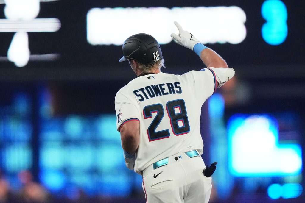 Miami Marlins' Kyle Stowers (28) runs the bases after hitting a two run home run during the fourth inning of a baseball game against the Washington Nationals, Saturday, May 9, 2026, in Miami. (AP Photo/Lynne Sladky)