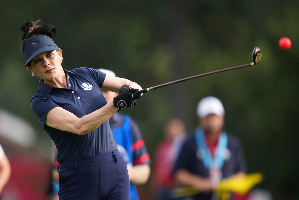 Europe's Catherine Zeta-Jones watches her tee shot on the third hole during the celebrity Ryder Cup golf tournament, Wednesday, Sept. 24, 2025, on the Bethpage Black golf course, in Farmingdale, N.Y. (AP Photo/Matt Slocum)
