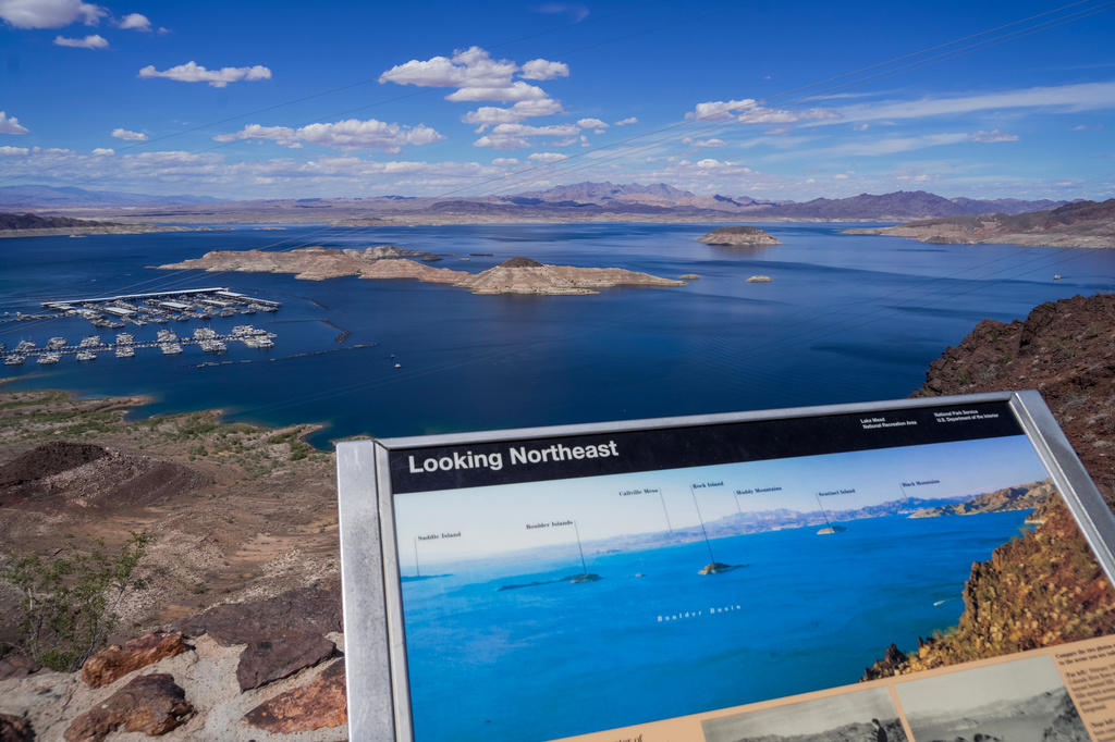 A informational map shows Lake Mead at a higher water level than is seen on Wednesday, Apr. 01, 2026, Boulder City, Nev. (AP Photo/Ty ONeil)