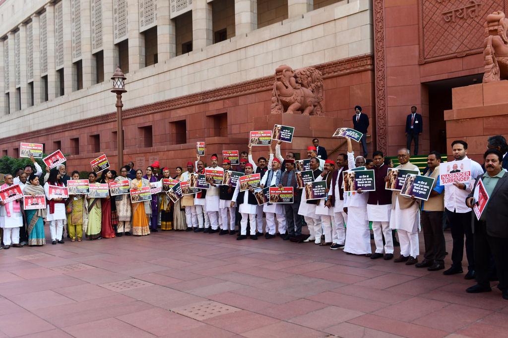 Members of the opposition stage a protest against the India-US trade deal outside the Parliament in New Delhi, India, Thursday, Feb. 12, 2026. (AP Photo)
