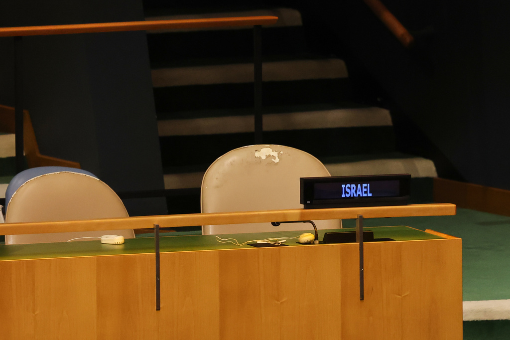 Chairs for delegates from the state of Israel are unoccupied as Palestinian President Mahmoud Abbas speaks via pre-recorded video during the 81st session of the United Nations General Assembly at United Nations headquarters, Thursday, Sept. 24, 2026. (AP Photo/Heather Khalifa)