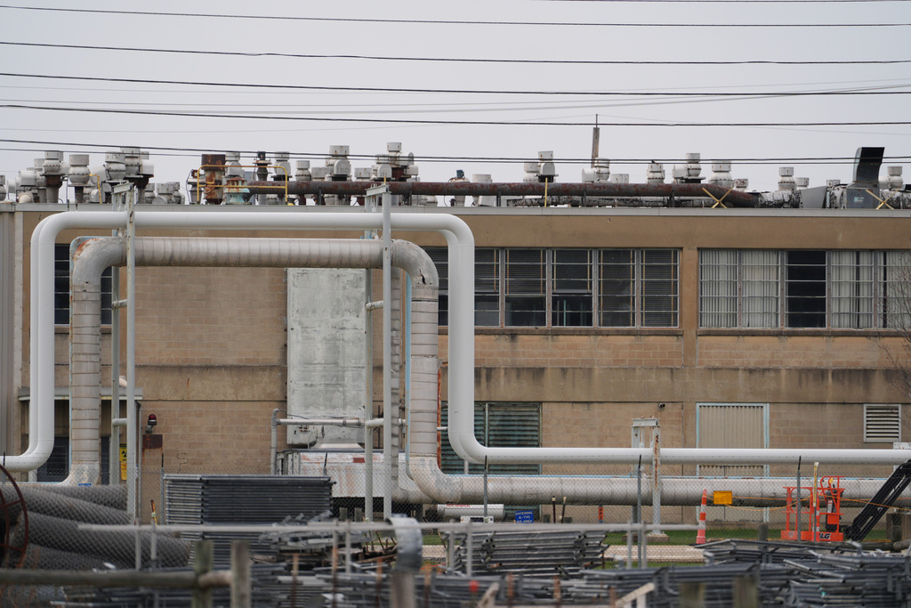 The Portsmouth Gaseous Diffusion Plant, a decommissioned uranium enrichment plant, is visible as the U.S. Department of Energy announces a new data center at the site Friday, March 20, 2026, in Piketon, Ohio. (AP Photo/Joshua A. Bickel)
