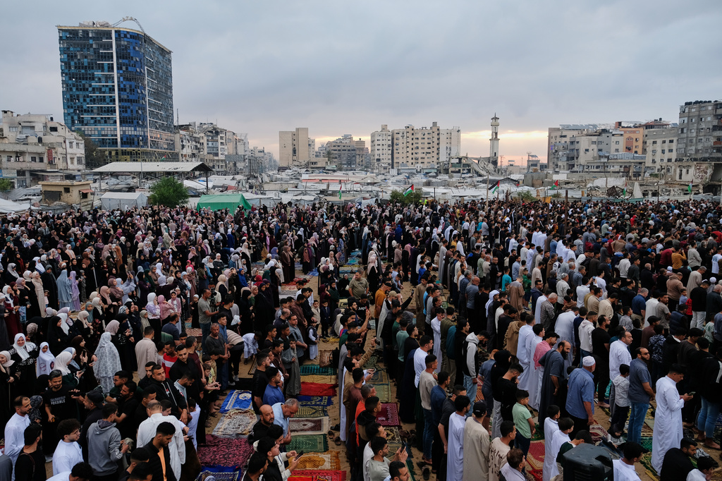 Muslims worshipers gather for Eid al-Adha prayers in Gaza City Wednesday, May 27, 2026. (AP Photo/Jehad Alshrafi)