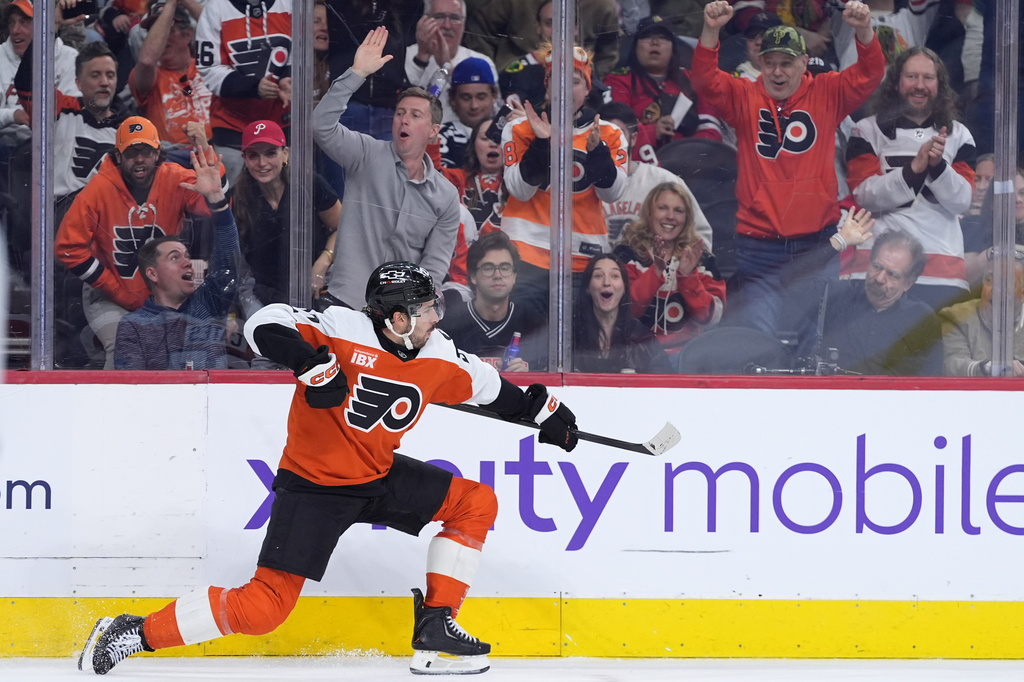 Philadelphia Flyers' Noah Cates celebrates after scoring a goal during the second period of an NHL hockey game against the Chicago Blackhawks Thursday, March 26, 2026, in Philadelphia. (AP Photo/Matt Slocum)