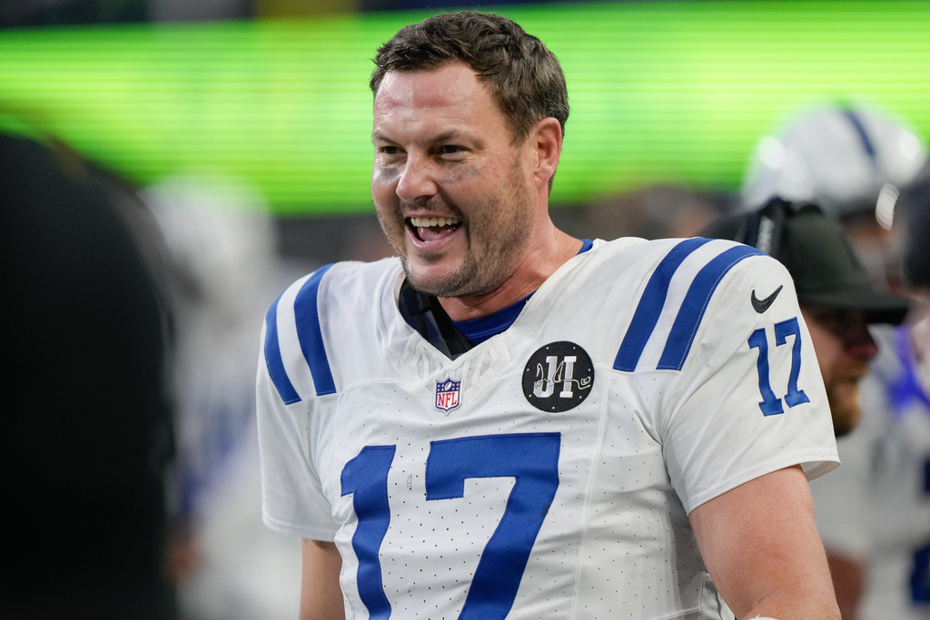 Indianapolis Colts quarterback Philip Rivers reacts during the second half of an NFL football game against the Seattle Seahawks, Sunday, Dec. 14, 2025, in Seattle. (AP Photo/Stephen Brashear)