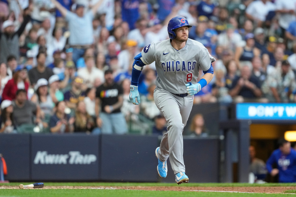 Chicago Cubs' Ian Happ rounds the bases after hitting a three-run home run during the sixth inning of a baseball game against the Milwaukee Brewers, Saturday, June 27, 2026, in Milwaukee. (AP Photo/Aaron Gash)