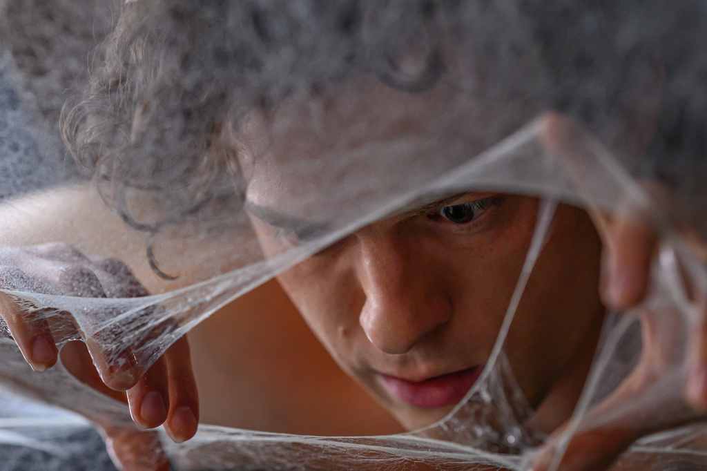 This image released by Sony Pictures shows Tom Holland in a scene from "Spider-Man: Brand New Day." (Sony Pictures via AP)