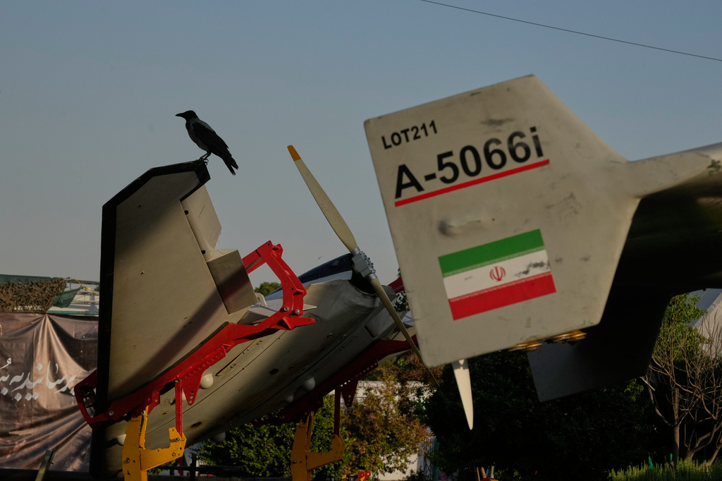 A crow sits on a drone displayed in a military exhibition commemorating the anniversary of the start of the 1980-88 Iraq-Iran war at Baharestan Square, in Tehran, Monday, Sept. 28, 2026. (AP Photo/Vahid Salemi)