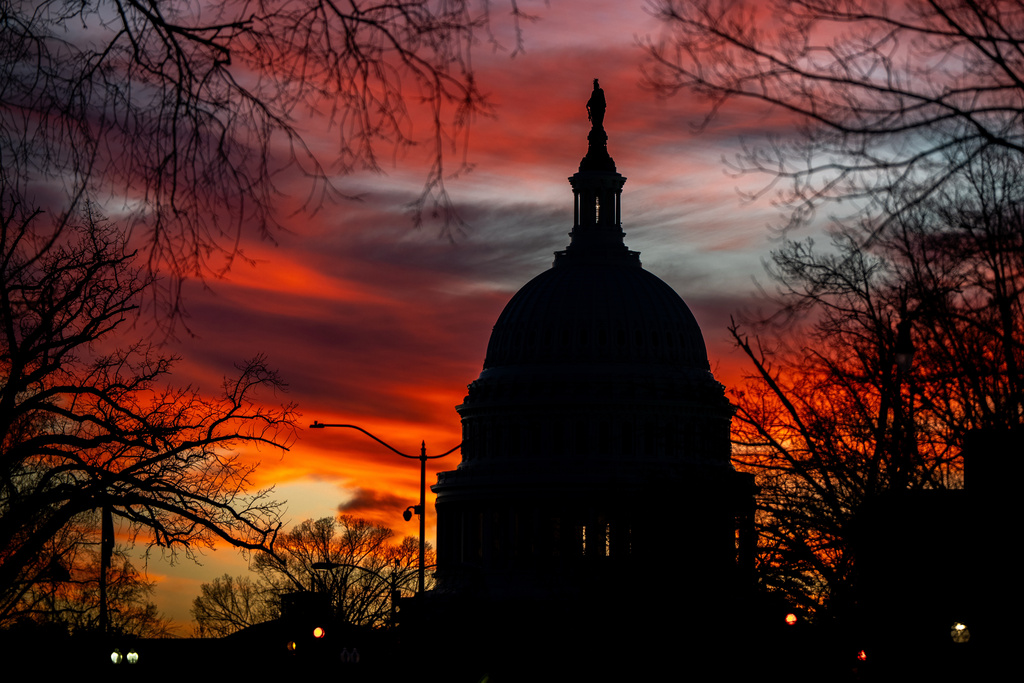 The U.S. Capitol is seen at sunset, Monday, Jan. 12, 2026, in Washington. (AP Photo/Julia Demaree Nikhinson)
