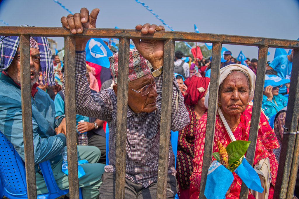 Supporters of the Rastriya Swatantra Party wait for the arrival of rapper-turned-politician Balendra Shah during an election campaign rally in Chitwan, approximately 180 kilometers (112 miles) west of Kathmandu, Nepal, Friday, Feb. 27, 2026. (AP Photo/Niranjan Shrestha)