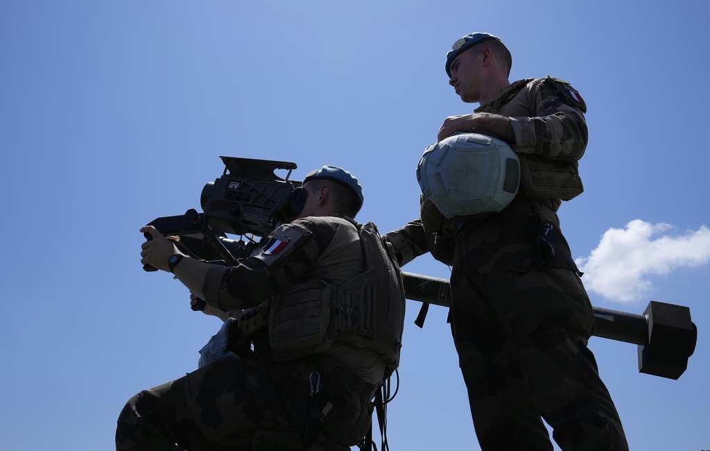 French U.N. peacekeepers use a Mistral air-defense system while inspecting their base in Deir Kifa, southern Lebanon, Wednesday, Aug. 20, 2025. (AP Photo/Hussein Malla)