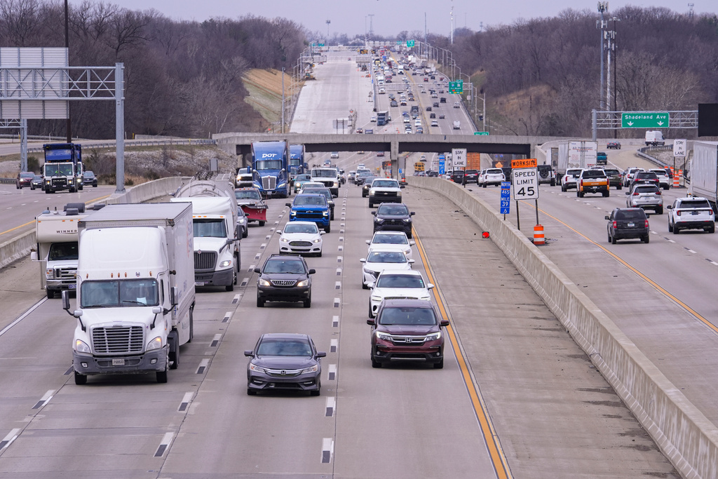 Traffic flows on I465 in Indianapolis, Tuesday, March 17, 2026. (AP Photo/Michael Conroy)