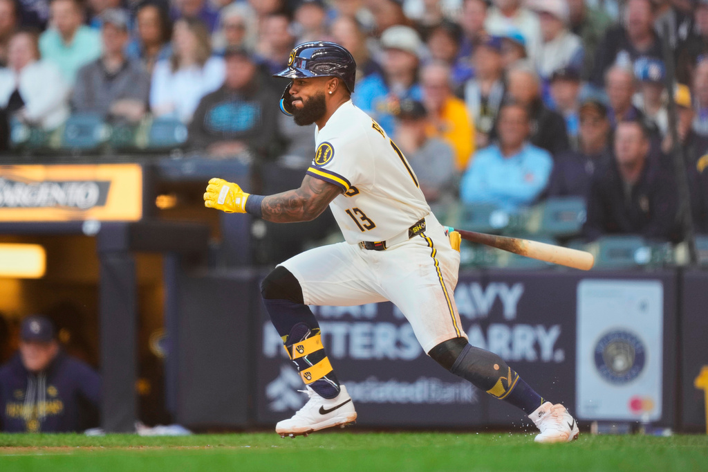 Milwaukee Brewers' Luis Rengifo hits a two-run RBI single during the first inning of a baseball game against the San Diego Padres, Thursday, May 14, 2026, in Milwaukee. (AP Photo/Kayla Wolf)