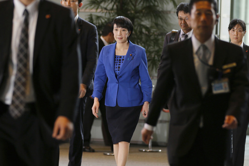 FILE - Japan's Internal Affairs Minister Sanae Takaichi, center, arrives at the prime minister's official residence in Tokyo, Aug. 3, 2016. (AP Photo/Shizuo Kambayashi, File) FILE - Japan's Internal Affairs Minister Sanae Takaichi, center, arrives at the prime minister's official residence in Tokyo, Aug. 3, 2016. (AP Photo/Shizuo Kambayashi, File)