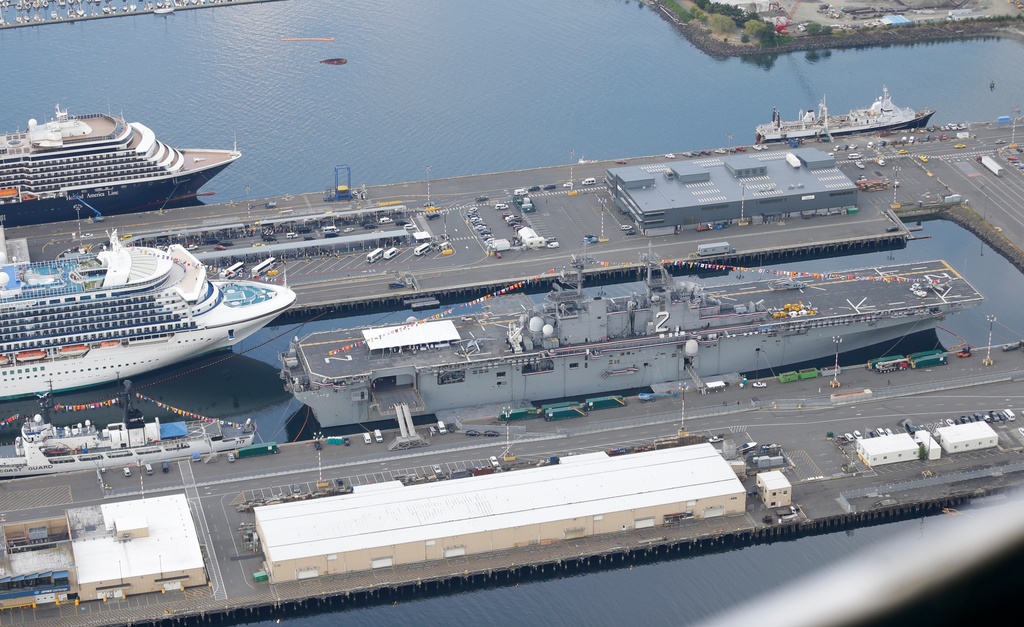 FILE -In this aerial photo taken Aug. 2, 2014, the U.S. Navy USS Essex is shown docked near downtown Seattle during the annual Seafair summer festival. (AP Photo/Ted S. Warren, File)