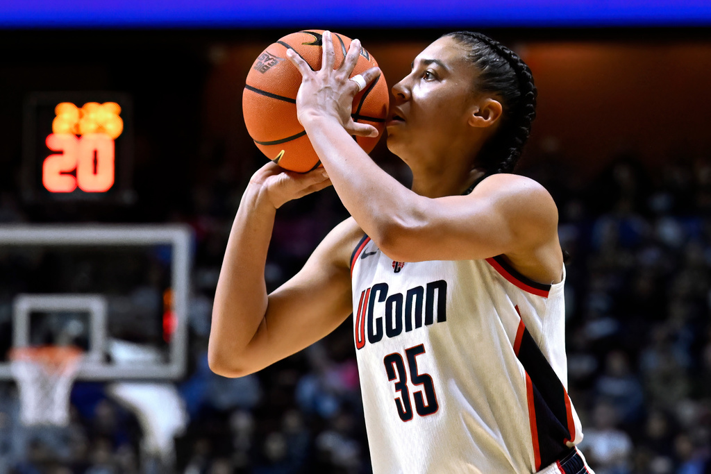 UConn guard Azzi Fudd (35) shoots during first half of an NCAA college basketball game against Georgetown in the quarterfinals of the Big East tournament, Saturday, March 7, 2026, in Uncasville, Conn. (AP Photo/Jessica Hill)