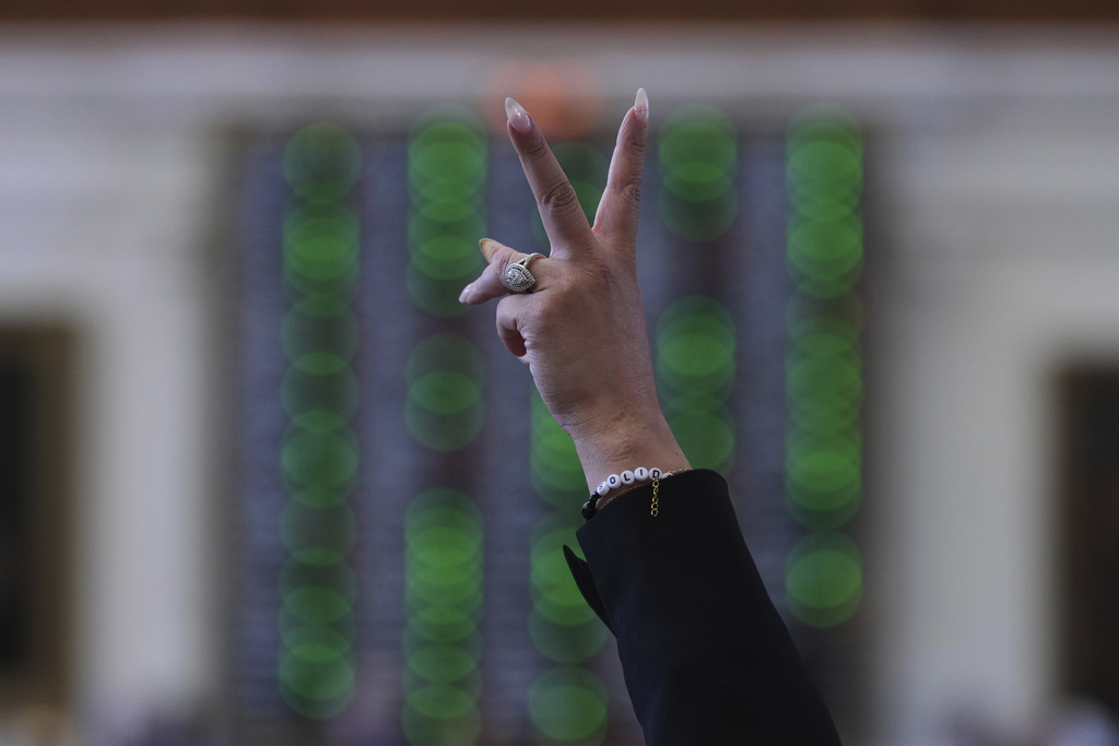 Democratic Texas state Rep. Cassandra Garcia Hernandez votes on a redrawn U.S. congressional map in Texas during a special session, Wednesday, Aug. 20, 2025, in Austin, Texas. (AP Photo/Eric Gay)