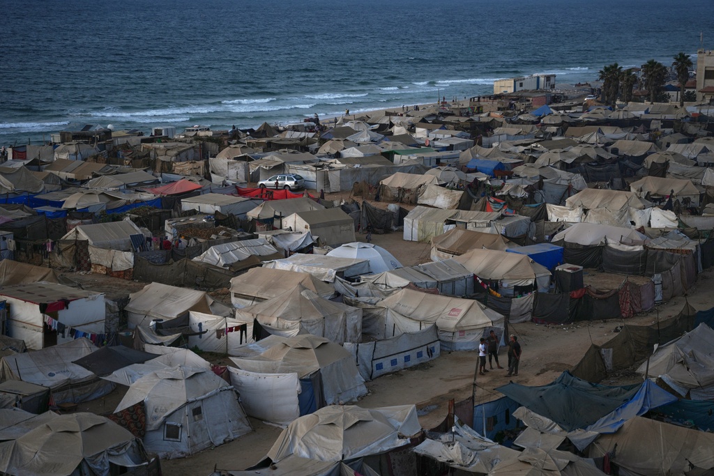 Tents fill a makeshift camp for displaced Palestinians in Zawaida, in the central Gaza Strip, on Saturday, Nov. 1, 2025. (AP Photo/Abdel Kareem Hana)