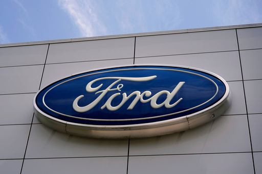 FILE - The Ford logo is seen above the entrance to the Ford Motor Company Kentucky Truck Plant, Wednesday, April 30, 2025, in Louisville, Ky. (AP Photo/Carolyn Kaster, File) FILE - The Ford logo is seen above the entrance to the Ford Motor Company Kentucky Truck Plant, Wednesday, April 30, 2025, in Louisville, Ky. (AP Photo/Carolyn Kaster, File)
