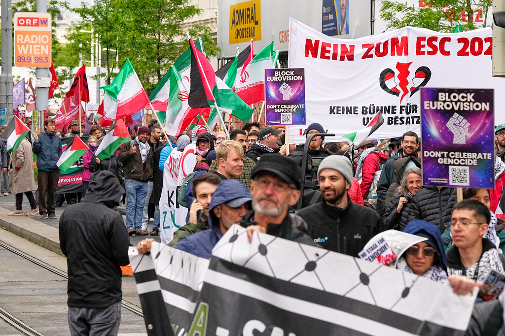 Demonstrators protest against Israel ahead of the Grand Final of the 70th Eurovision Song Contest in Vienna, Austria, Saturday, May 16, 2026. (AP Photo/Martin Meissner)