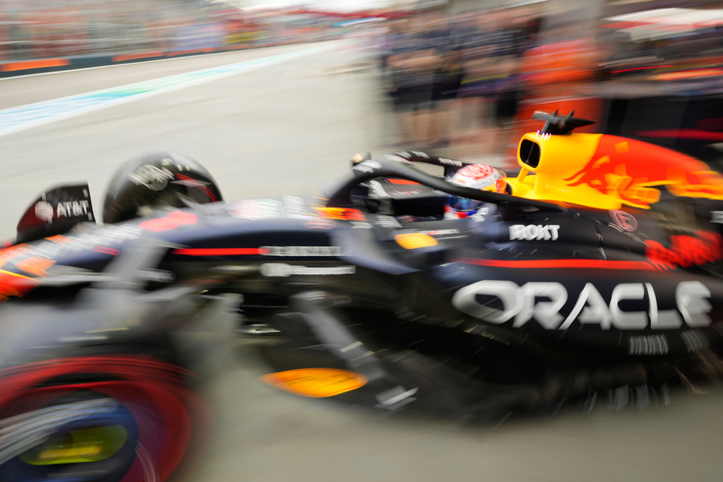 Red Bull driver Max Verstappen of the Netherlands drives out of his garage during the first practice session of the Singapore Formula One Grand Prix at the Marina Bay Street Circuit in Singapore, Friday, Oct. 3, 2025. (AP Photo/Vincent Thian)