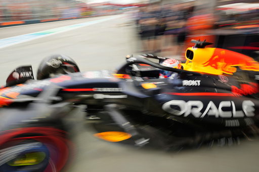 Red Bull driver Max Verstappen of the Netherlands drives out of his garage during the first practice session of the Singapore Formula One Grand Prix at the Marina Bay Street Circuit in Singapore, Friday, Oct. 3, 2025. (AP Photo/Vincent Thian) Red Bull driver Max Verstappen of the Netherlands drives out of his garage during the first practice session of the Singapore Formula One Grand Prix at the Marina Bay Street Circuit in Singapore, Friday, Oct. 3, 2025. (AP Photo/Vincent Thian)