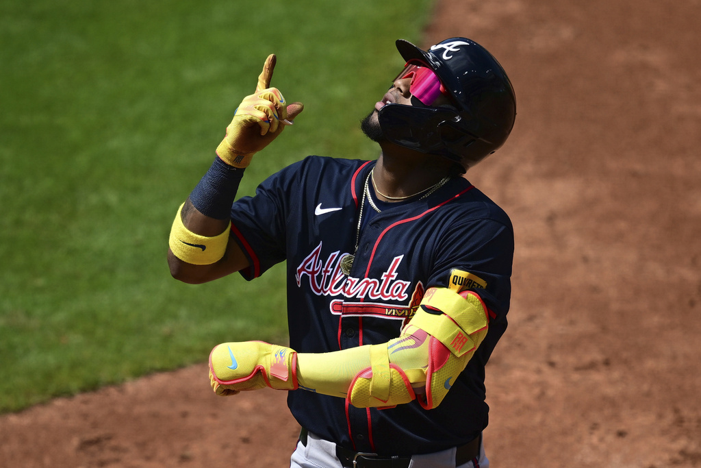 Atlanta Braves' Ronald Acuna Jr. celebrates after hitting a single during the third inning of a baseball game against the Cleveland Guardians, Sunday, Aug. 17, 2025, in Cleveland. (AP Photo/David Dermer)