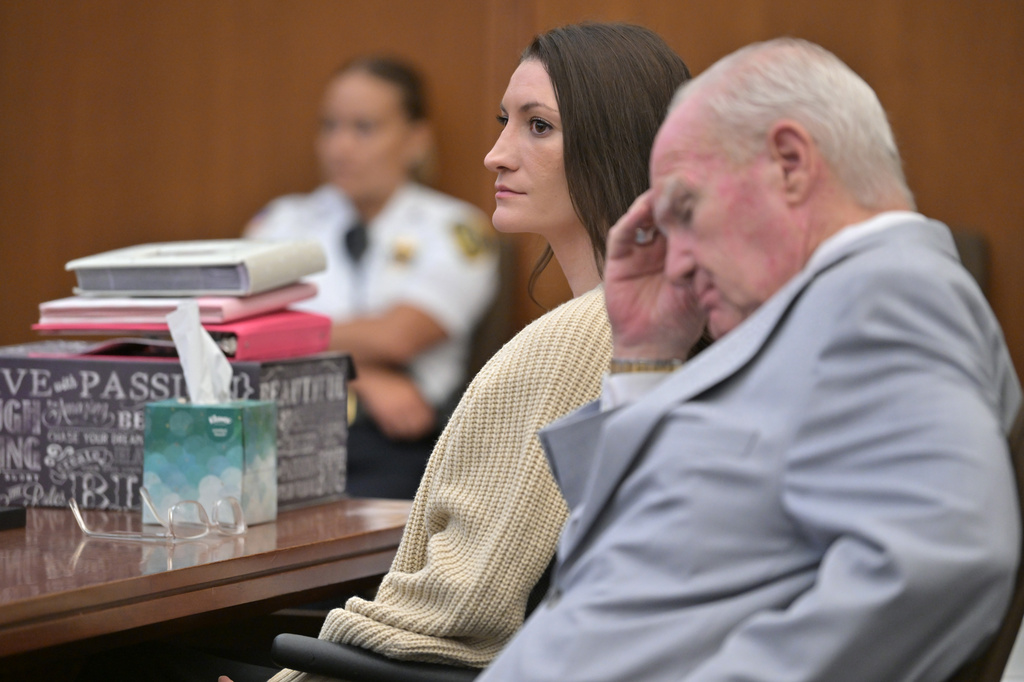 Lindsay Clancy looks toward the jury as she sits beside her lawyer Kevin Reddington, during proceedings in her murder trial, Thursday, Aug. 20, 2026, in Plymouth, Mass. (AP Photo/Josh Reynolds, Pool)