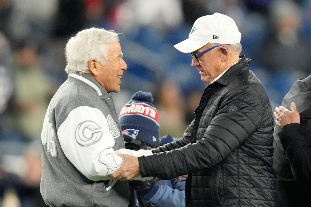 New England Patriots owner Robert Kraft, meets with New York Jets owner Woody Johnson ahead of an NFL football game, Thursday, Nov. 13, 2025, in Foxborough, Mass. (AP Photo/Charles Krupa)