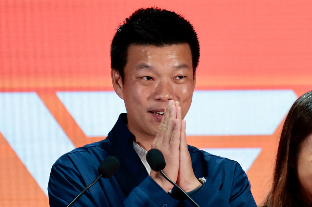 Leader of People's Party and prime minister candidate Natthaphong Ruengpanyawut gestures after a press conference following the general election in Bangkok, Sunday, Feb. 8, 2026. (AP Photo/Wason Wanichakorn)