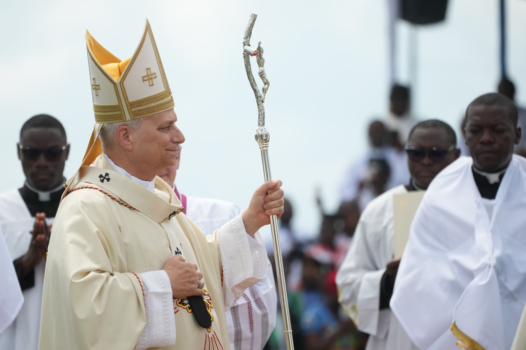 Pope Leo XIV arrives in procession to celebrate Mass at the Japoma Stadium, in Douala, Cameroon, Friday, April 17, 2026 on the fifth day of his 11-day pastoral visit to Africa. (AP Photo/Andrew Medichini)
