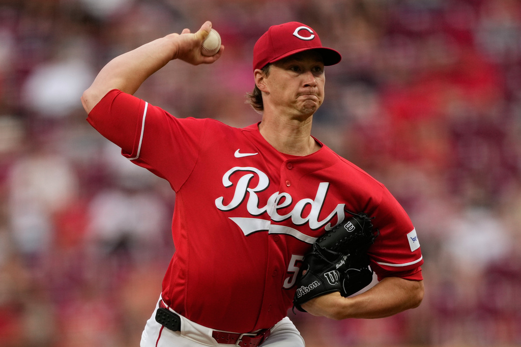 Cincinnati Reds pitcher Brady Singer throws during the first inning of a baseball against the Milwaukee Brewers in Cincinnati, Monday, June 22, 2026. (AP Photo/Carolyn Kaster)