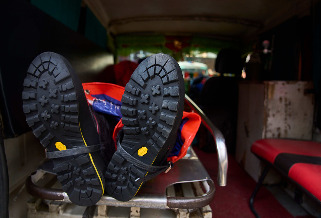 An ambulance carrying the body of a climber killed in an avalanche on Mount Yalung Ri arrives at the morgue of Tribhuvan University Teaching Hospital in Kathmandu, Nepal, Wednesday, Nov. 5, 2025. (AP Photo/Niranjan Shrestha)