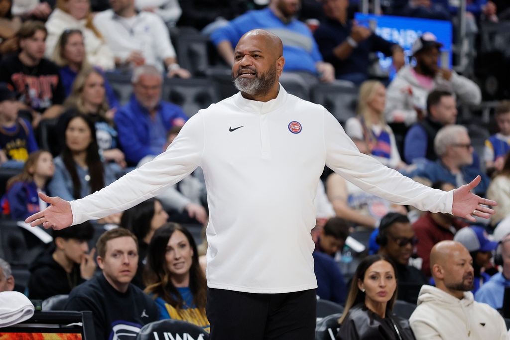 Detroit Pistons head coach J.B. Bickerstaff gestures toward an official during the first half of an NBA basketball game against the Golden State Warriors, Friday, March 20, 2026, in Detroit. (AP Photo/Duane Burleson)