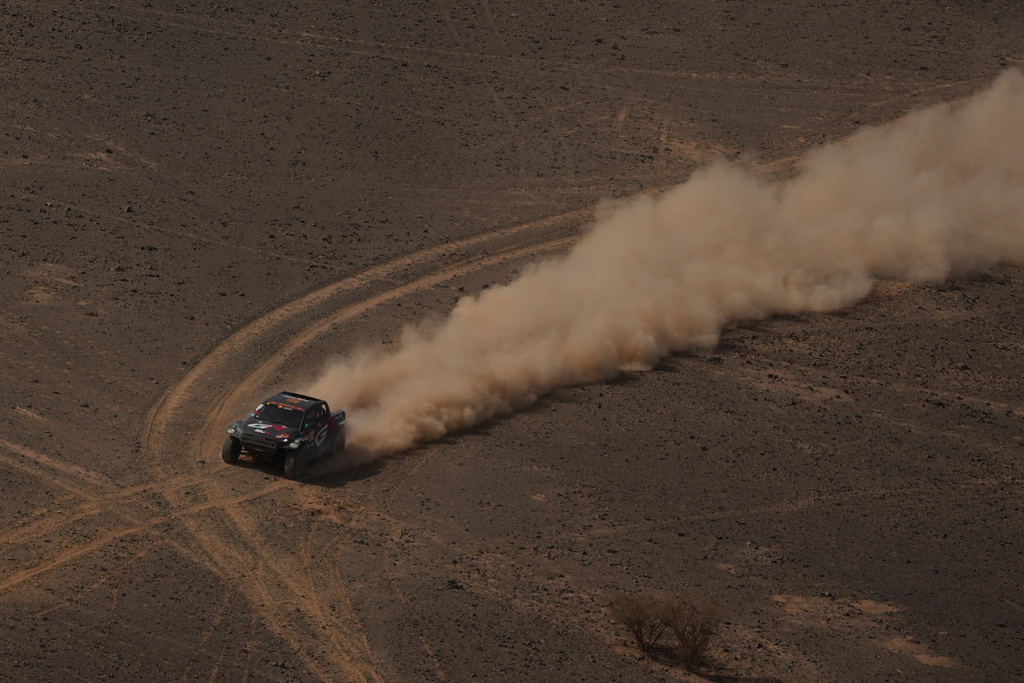 Driver Joao Ferreira and co-driver Filipe Palmeiro compete during the seventh stage of the Dakar Rally between Riyadh and Wadi Ad Dawasir, Saudi Arabia, Sunday, Jan.11, 2026. (AP Photo/Thibault Camus)