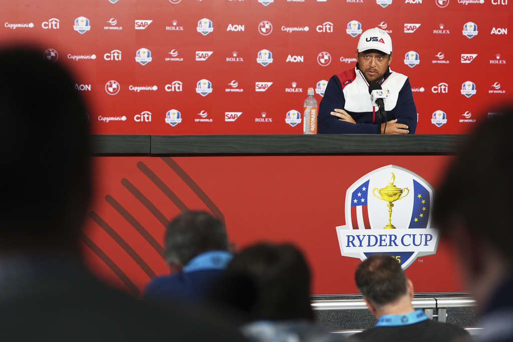 United States' Xander Schauffele speaks during a news conference before a practice round at the Ryder Cup golf tournament, Tuesday, Sept. 23, 2025, in Farmingdale, N.Y., at Bethpage State Park's Black Course between the United States and Europe. (AP Photo/Lindsey Wasson)