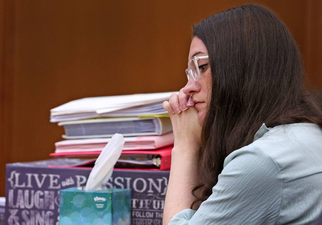 Lindsay Clancy listens to her mother Paula Musgrove on the witness stand during her murder trial in Plymouth Superior Court, in Plymouth, Mass., Monday, Aug. 17, 2026. (Greg Derr/The Patriot Ledger via AP, Pool)
