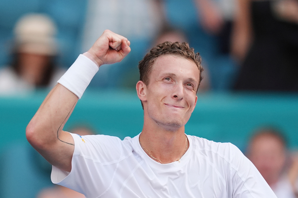 Jiri Lehecka of the Czech Republic celebrates after winning a semifinal match against Arthur Fils of France, at the Miami Open tennis tournament, Friday, March 27, 2026, in Miami Gardens, Fla. (AP Photo/Rebecca Blackwell)