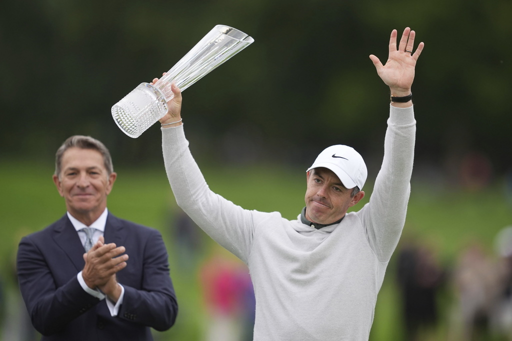 Northern Ireland's Rory McIlroy celebrates after his victory over Sweden's Joakim Lagergren following a playoff for 1st place on day four of the 2025 Amgen Irish Open at The K Club in Straffan, Ireland, Sunday, Sept. 7, 2025. (Brian Lawless/PA via AP)