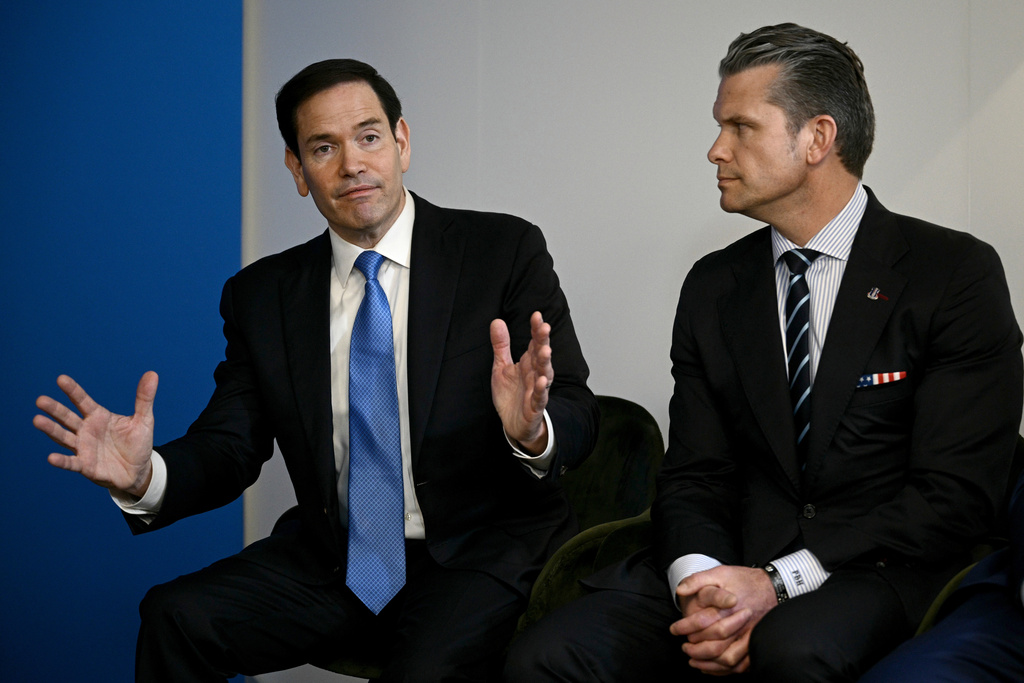 FILE - Secretary of State Marco Rubio, left, speaks next to Defense Secretary Pete Hegseth during a meeting between U.S. President Donald Trump with NATO Secretary General Mark Rutte at the NATO summit of heads of state and government in The Hague, Netherlands, June 25, 2025. (Brendan Smialowski/Pool Photo via AP, file)