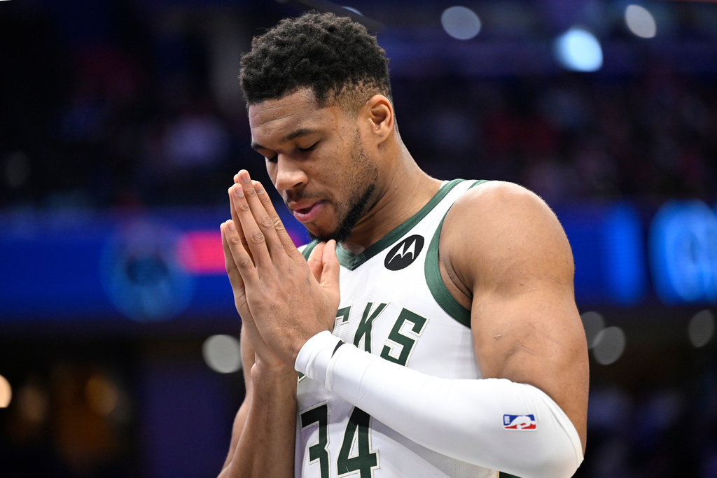 Milwaukee Bucks forward Giannis Antetokounmpo pauses before an NBA basketball game against the Washington Wizards, Monday, Dec. 1, 2025, in Washington. (AP Photo/John McDonnell)