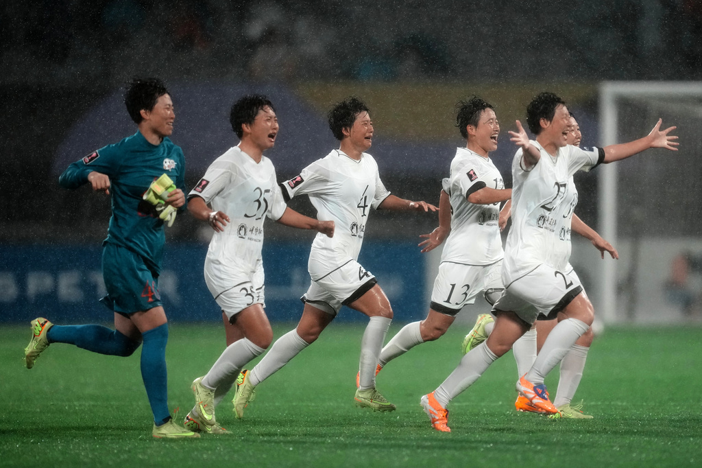 North Korea's Naegohyang Women's FC players celebrate after defeating South Korea's Suwon FC in their AFC Women's Champions League semifinal match in Suwon, South Korea, Wednesday, May 20, 2026. (AP Photo/Lee Jin-man)