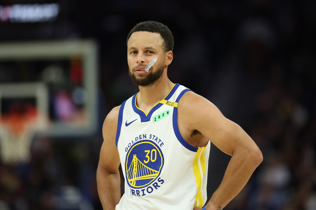 Golden State Warriors guard Stephen Curry stands on the court during the first half of a preseason NBA basketball game against the Sacramento Kings in San Francisco, Saturday, Oct. 10, 2026. (AP Photo/Jed Jacobsohn)
