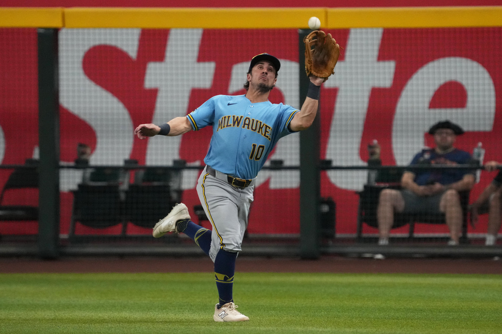 Milwaukee Brewers right fielder Sal Frelick makes a running catch on a ball hit by Arizona Diamondbacks' Tommy Troy in the third inning of a baseball game, Friday, July 3, 2026, in Phoenix. (AP Photo/Rick Scuteri)